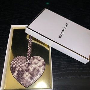 Michael Kors’ Monogram Charm